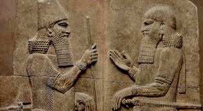 Wall panel displaying Assyrian King Sargon II facing a man thought to be the crown prince, his son Sennacherib