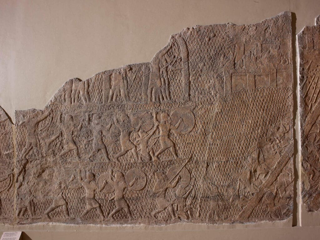depiction of the start of the siege on Lachish with slingmen, archers and spearmen