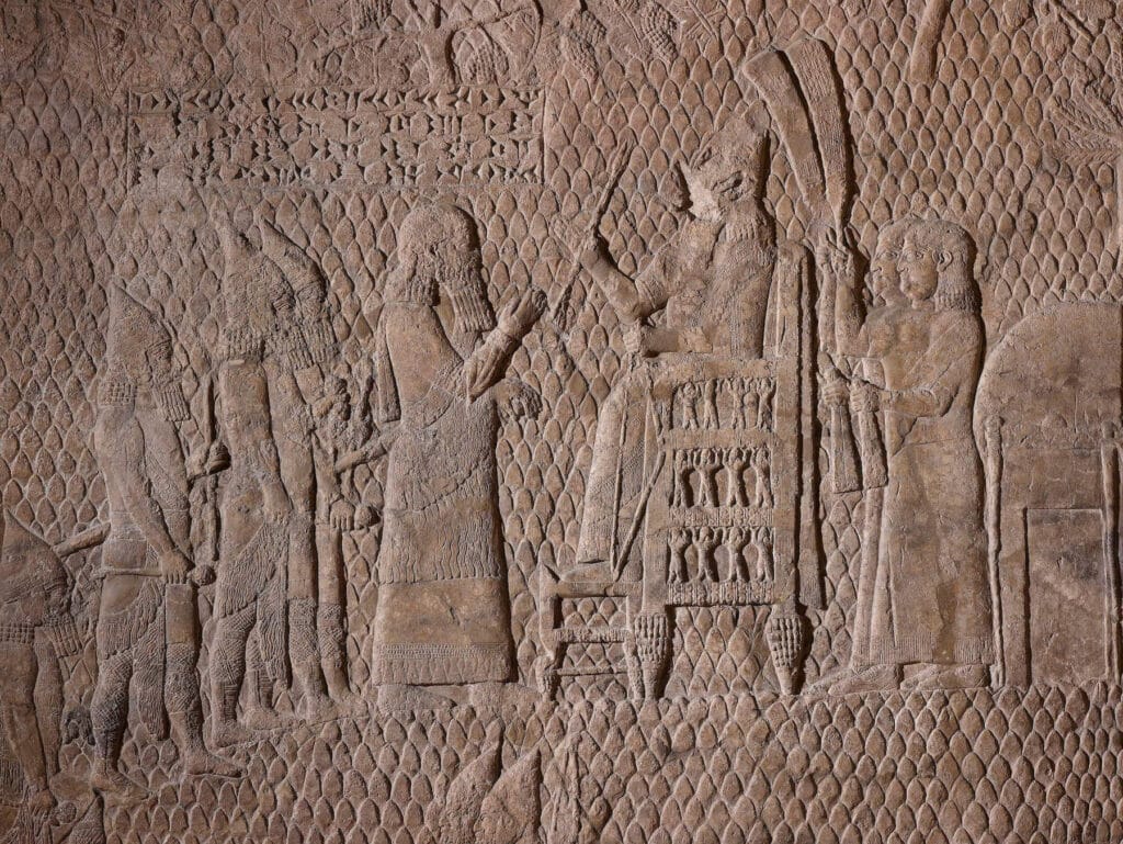 Depiction of the Assyrian king, Sennacherib sat on his throne at the end of battle